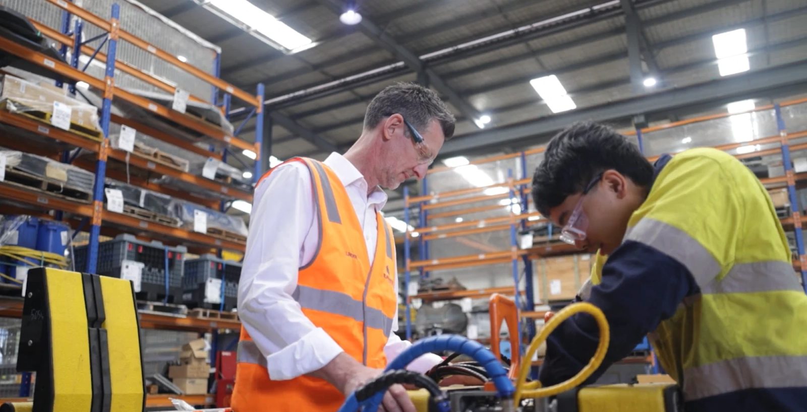 Linden Jones, Managing Director, at the workshop bench with a Blakemere technician working on a tool