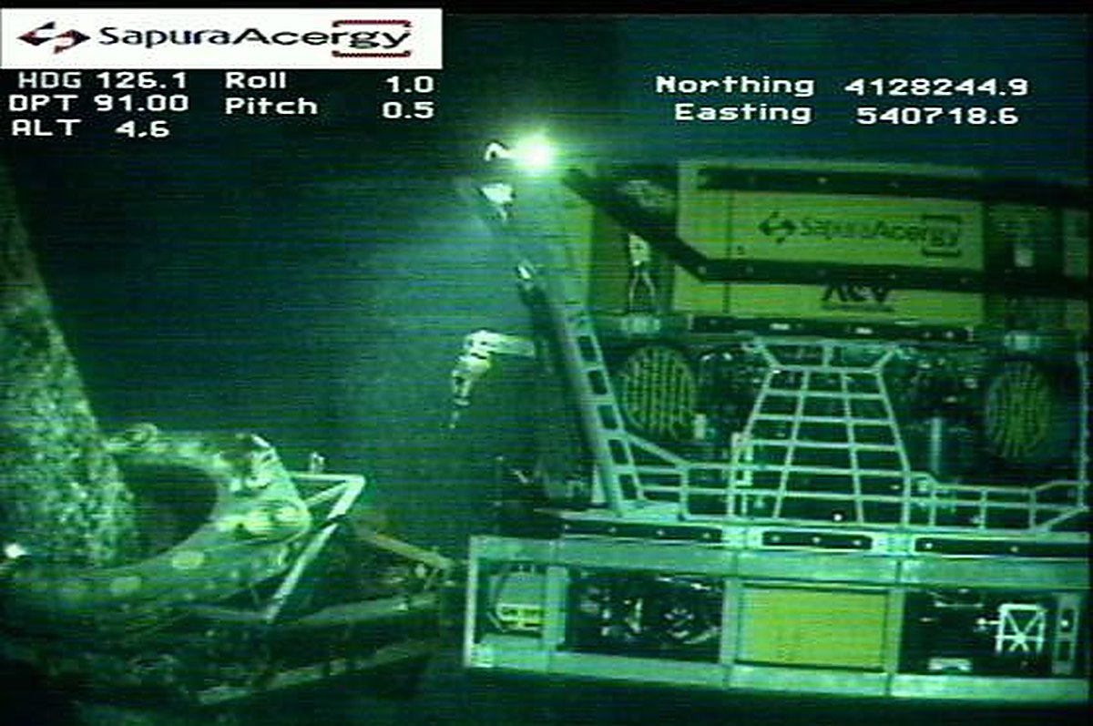 A saw being positioned on the jacket by work class ROV