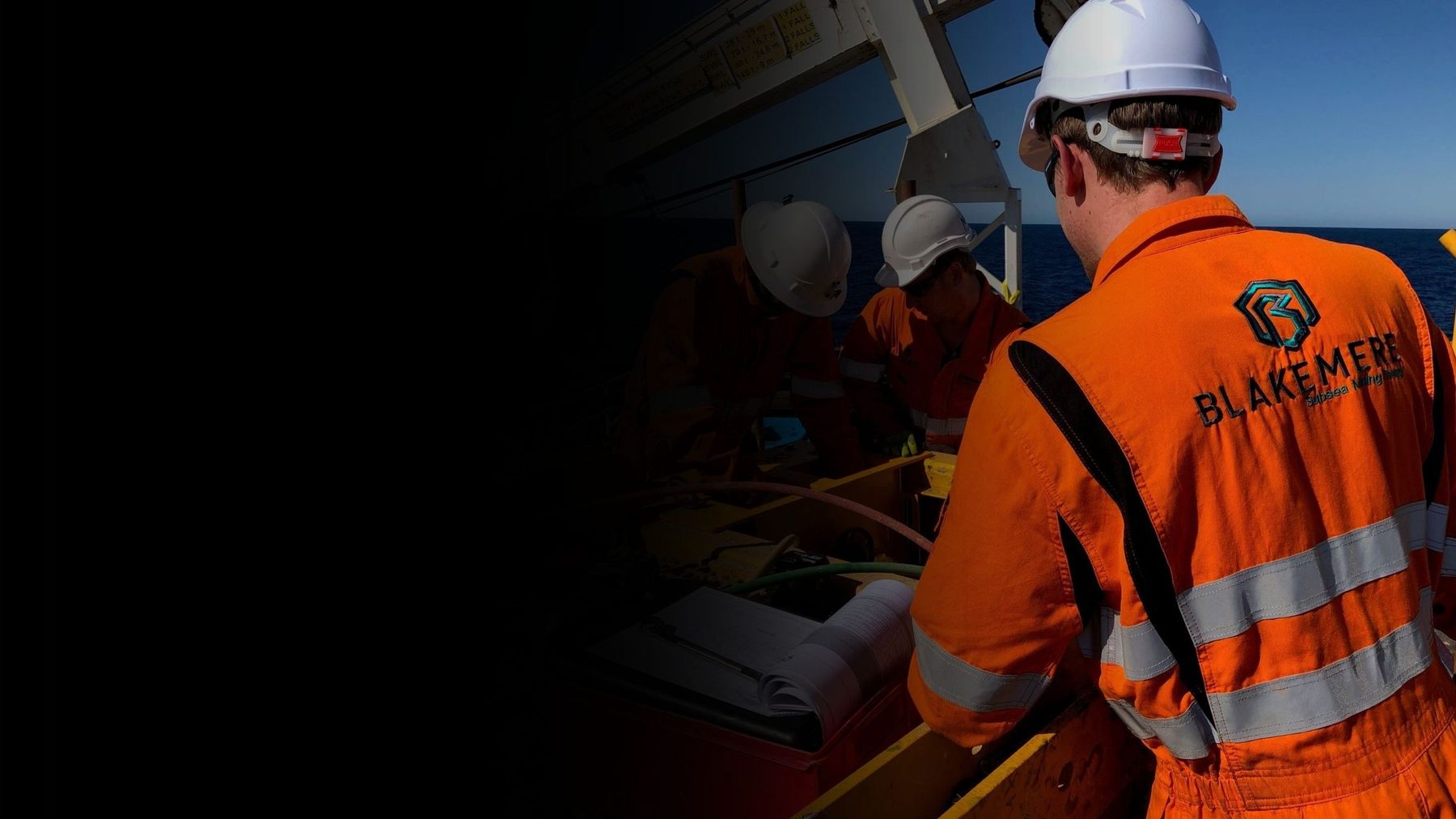 Blakemere crew in branded coveralls working on deck offshore