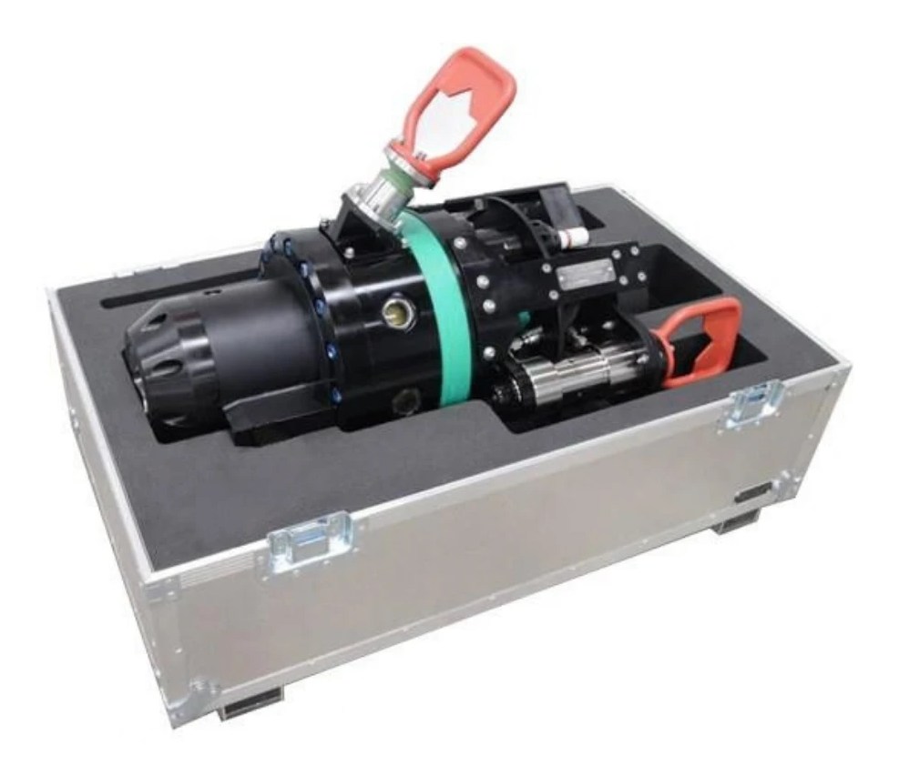 Class 5 torque tool, black with a green band and two red ROV handles, packed in an open aluminium transit case lined with black foam