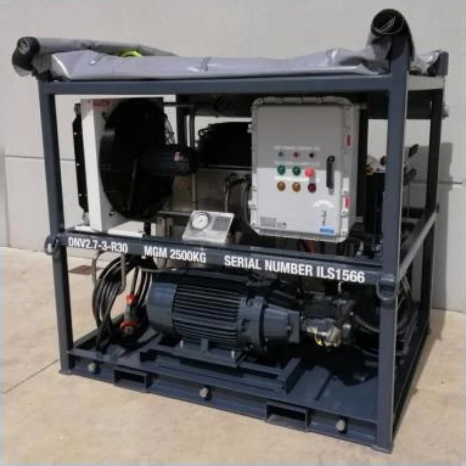 Electric hydraulic power unit in a grey skid frame with a canvas cover on top, cooler fan, control box with indicator lights, and the electric motor and pump on the base