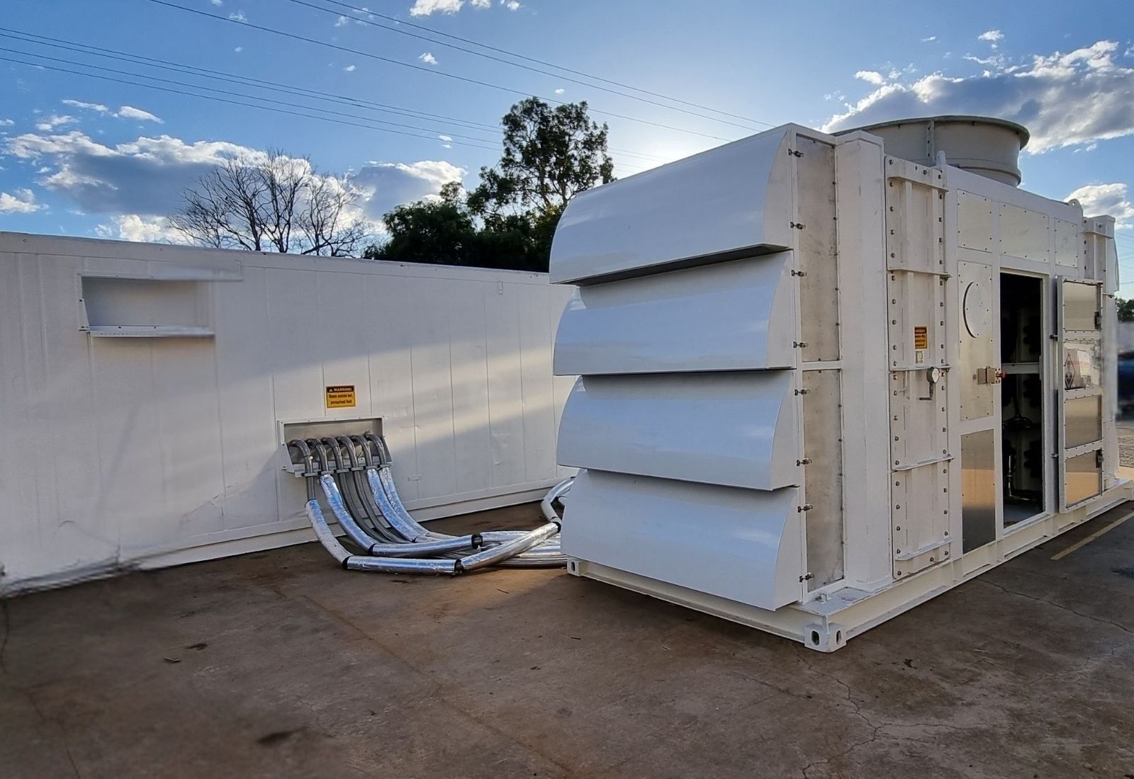 The direct air carbon capture prototype, a container-mounted unit with stacked air contactor panels and ducting